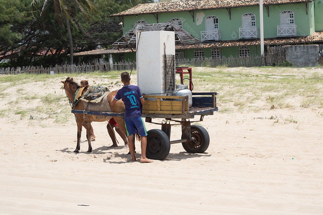 Carroça levando cargas sobre dunas areia