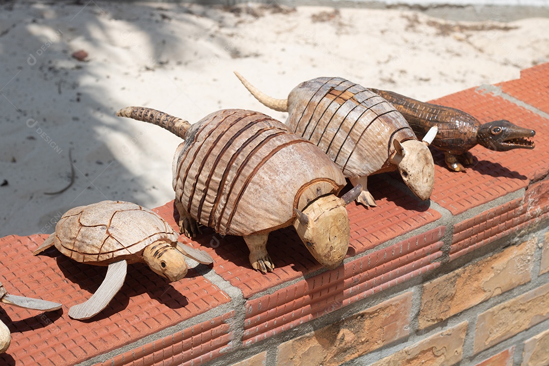 Miniaturas sobre uma dunas de areia