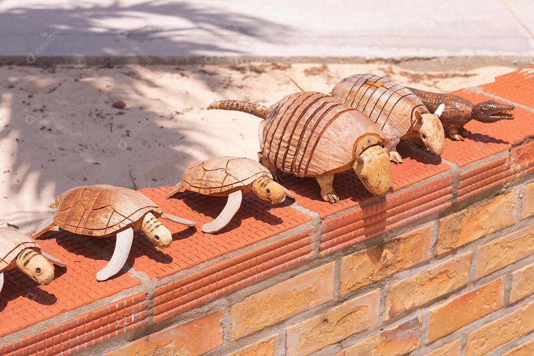 Miniaturas sobre uma dunas de areia