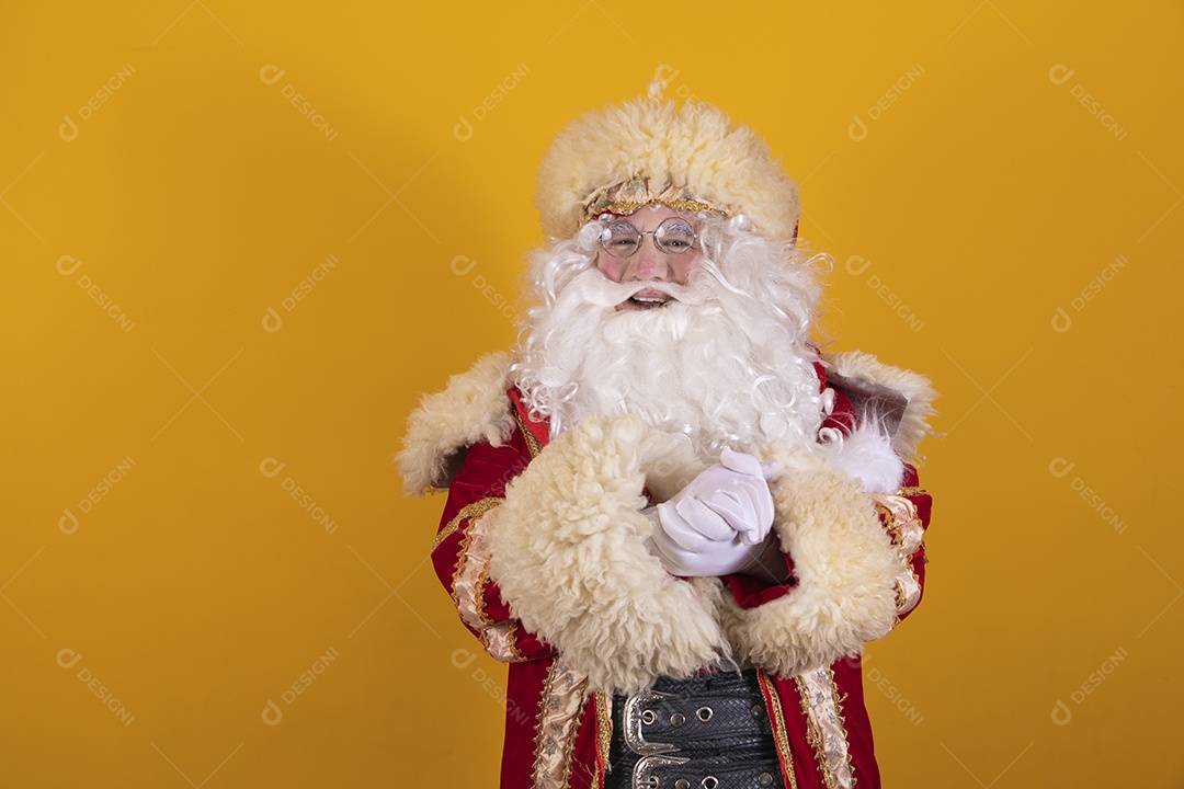 Happy smiling Santa Claus Merry Christmas isolated yellow background