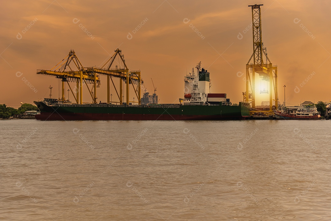 Cargo port was reached by a large crane. The freighter docked at the port