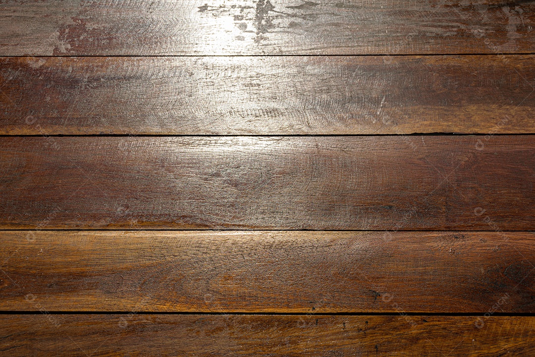 Wooden table texture. Wooden slats. Sunlight illuminating from above.