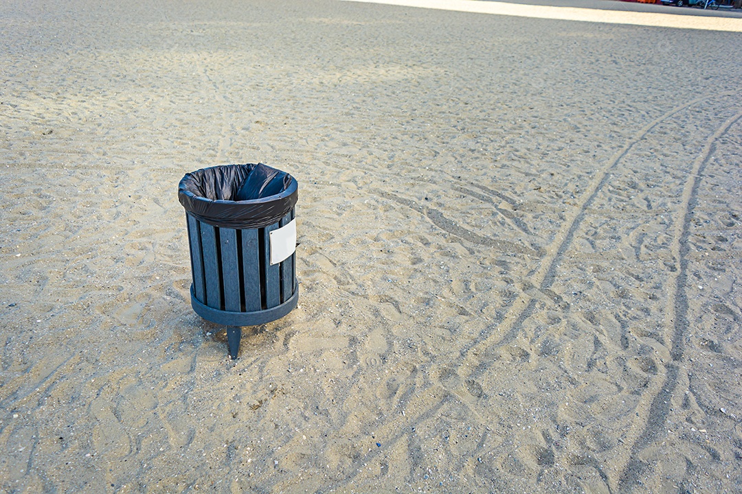 Garbage can on the beach, cleaning concept in busy tourist places
