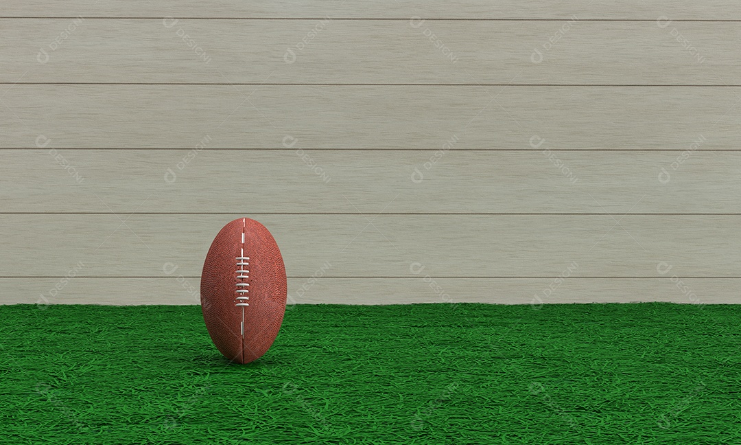 Gramado com bola de futebol americano