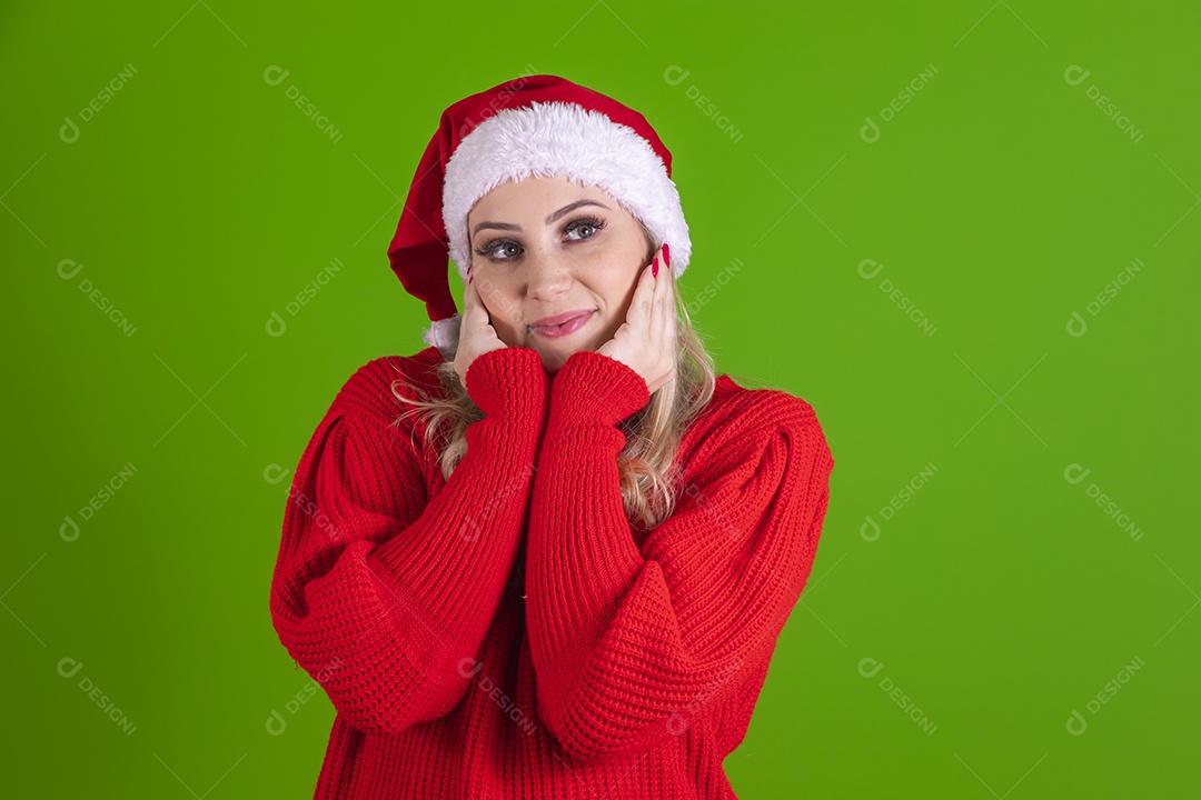 Beautiful young woman Santa Claus wearing Santa's hat over isolated background
