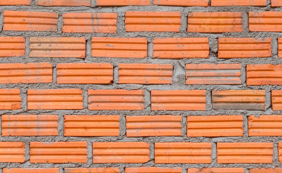 Parede de tijolos laranja usada como textura de fundo definida