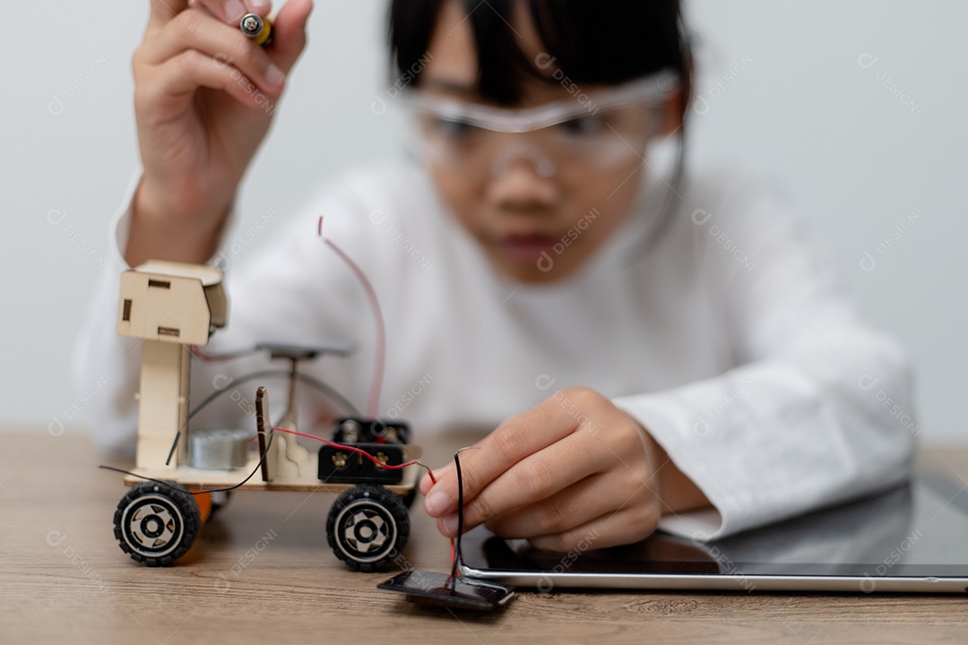 Students from Asia learn to code robot cars and electronics at home