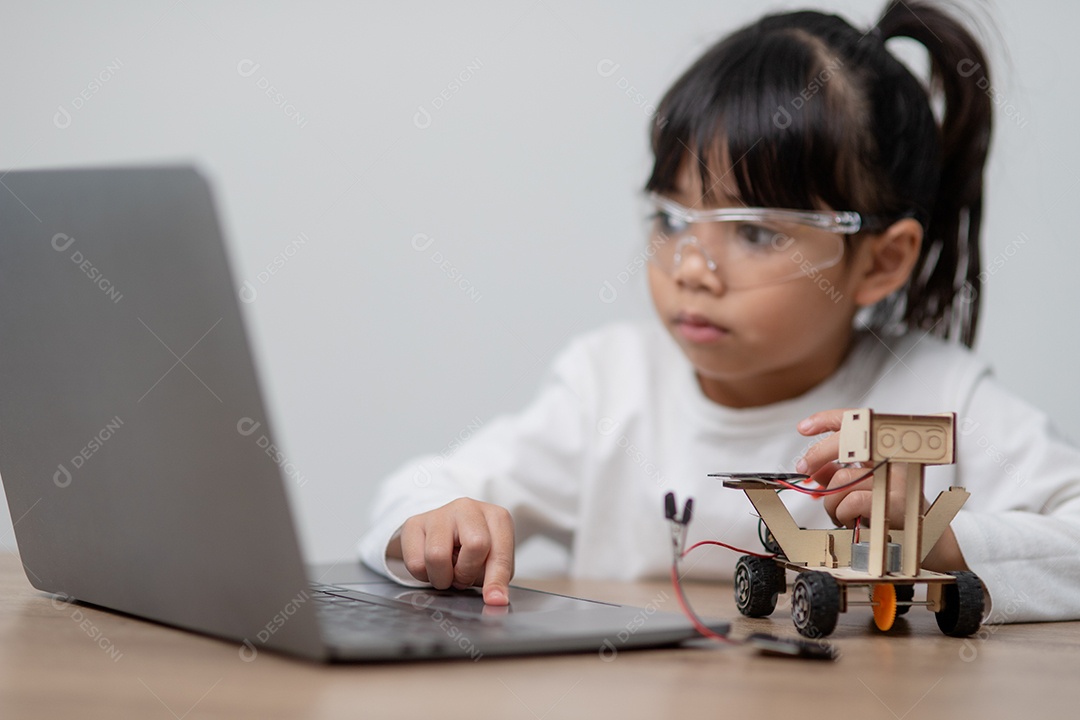 Students from Asia learn to code robot cars and electronics at home