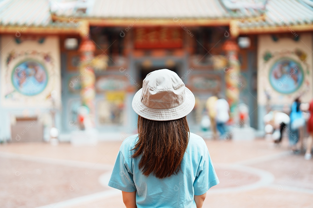 Woman traveling in Wat Mangkorn Kammalawas, Leng Nuei Yee as Chinese temple.