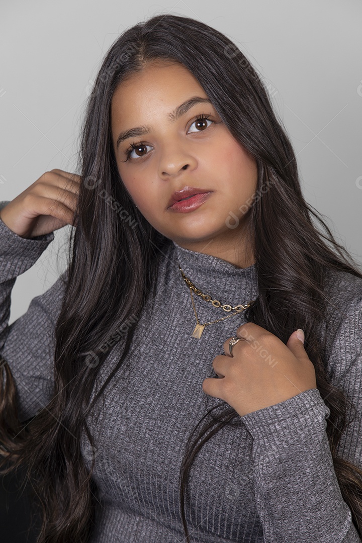 Beautiful woman taking portraits over isolated background