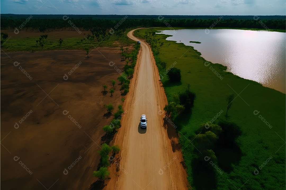Vista aérea de uma estrada rural através de terras agrícolas. Fundo de paisagem natural. ensolarado