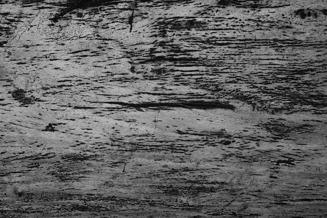 O fundo preto e cinza escuro da parede turva tem um pouco de luz abstrata