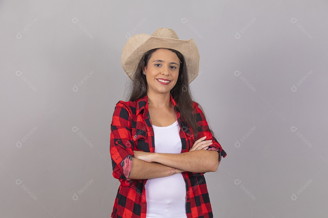 Linda mulher jovem agropecuarista sobre fundo isolado
