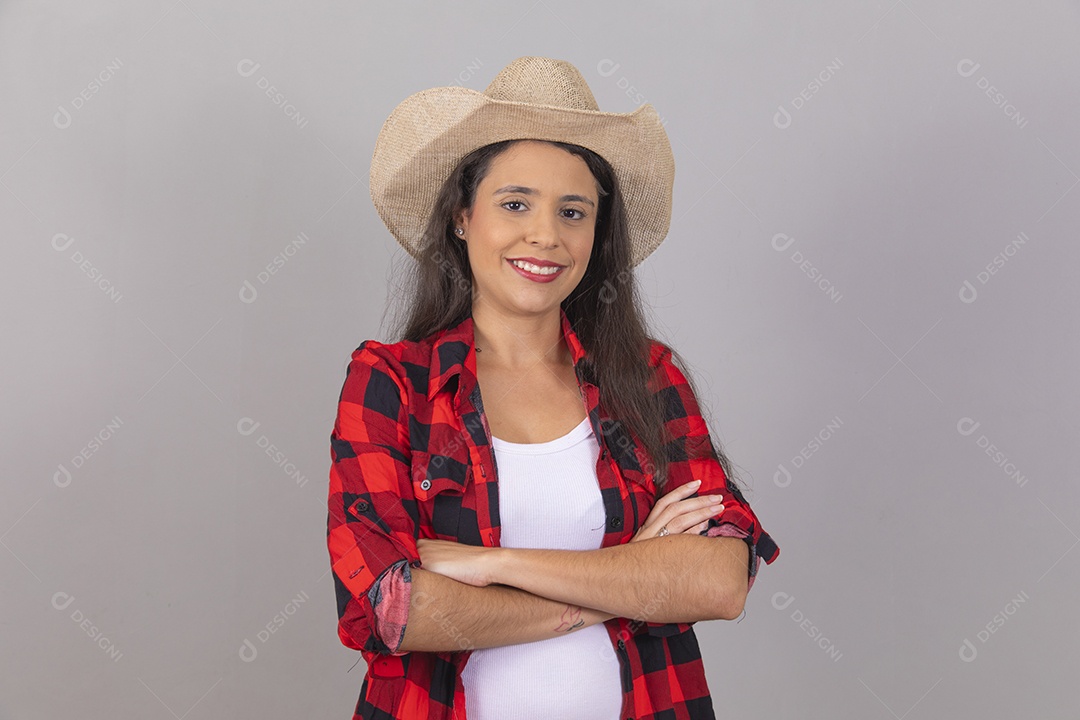 Linda mulher jovem agropecuarista sobre fundo isolado