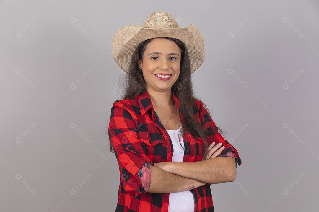 Linda mulher jovem agropecuarista sobre fundo isolado