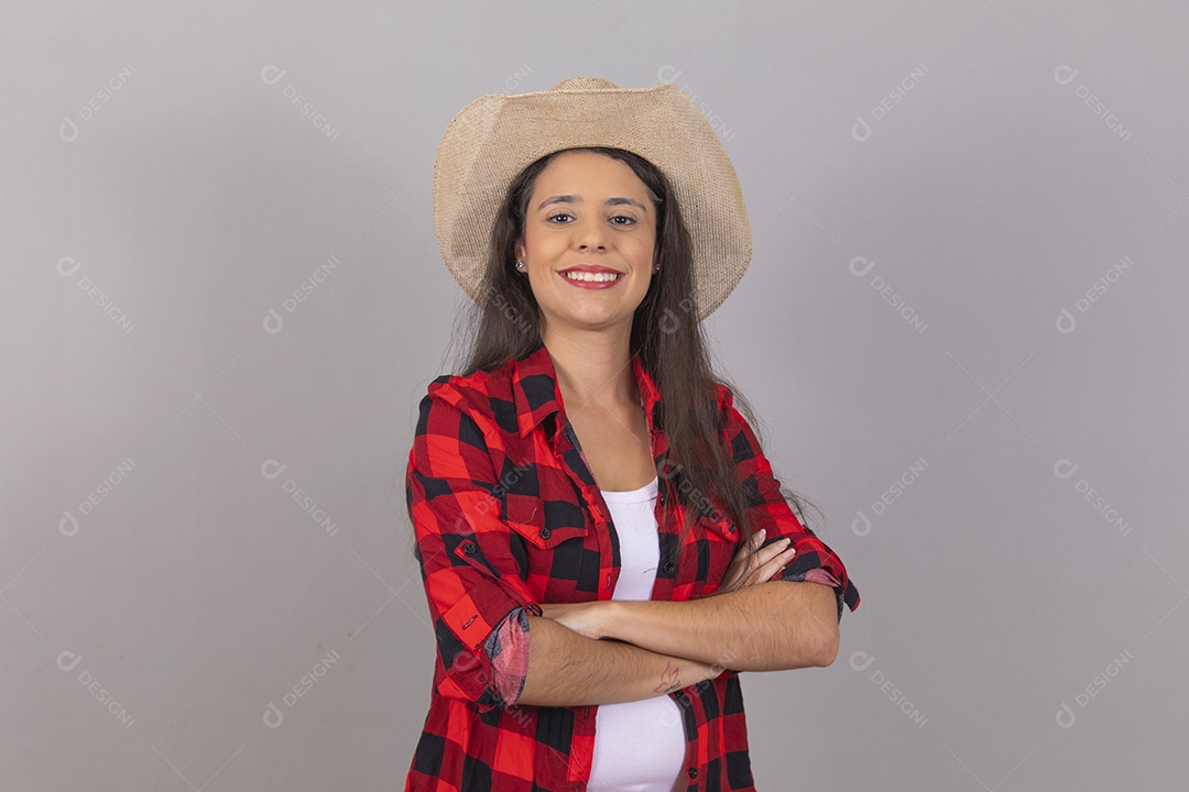 Linda mulher jovem agropecuarista sobre fundo isolado