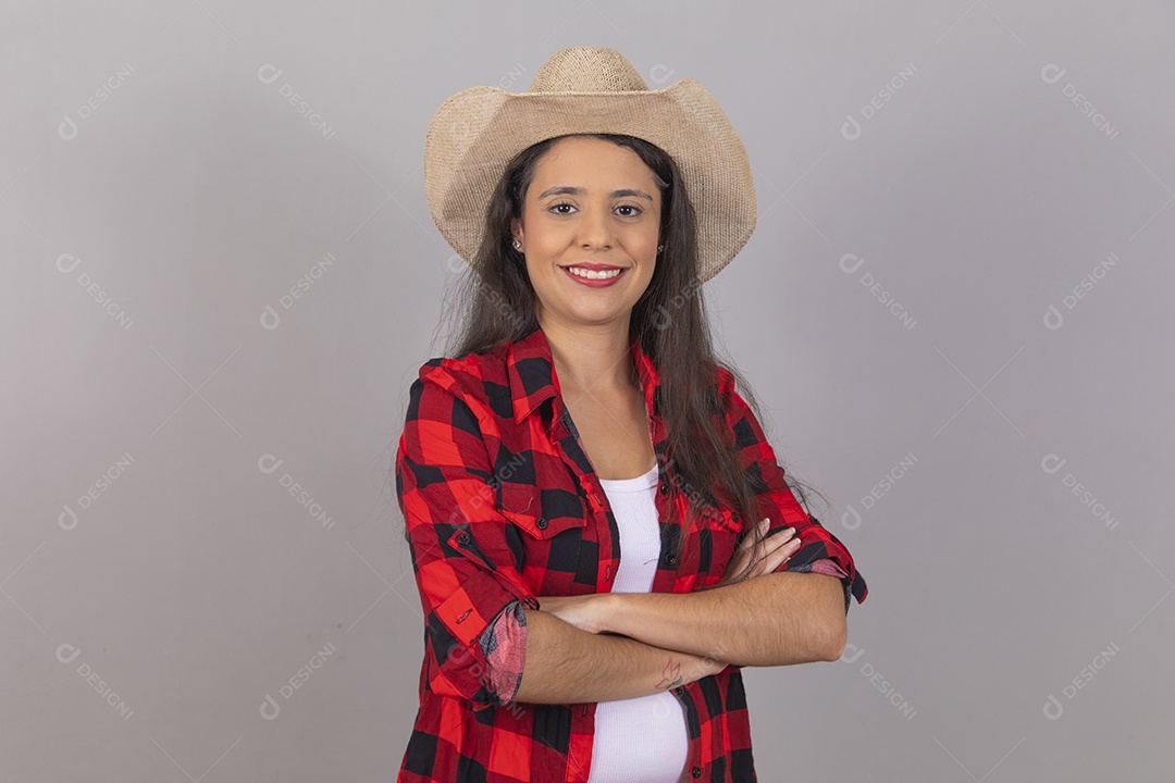 Linda mulher jovem agropecuarista sobre fundo isolado