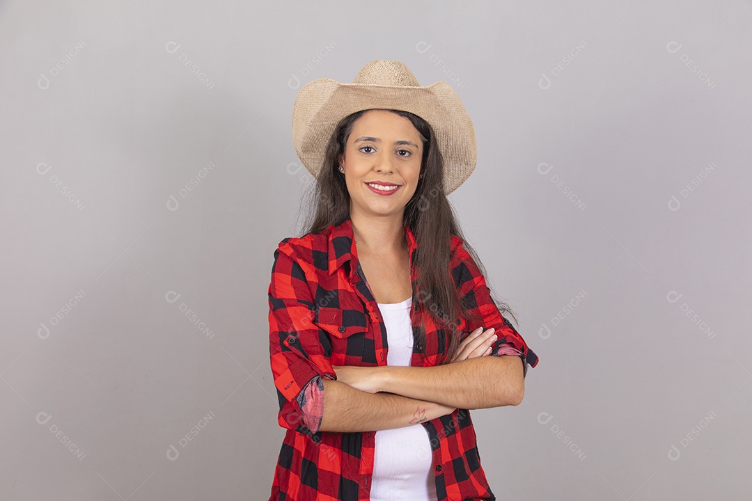 Linda mulher jovem agropecuarista sobre fundo isolado