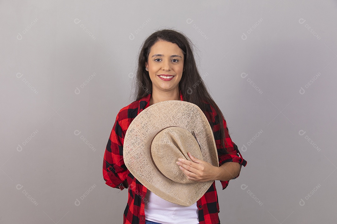 Linda mulher jovem agropecuarista sobre fundo isolado