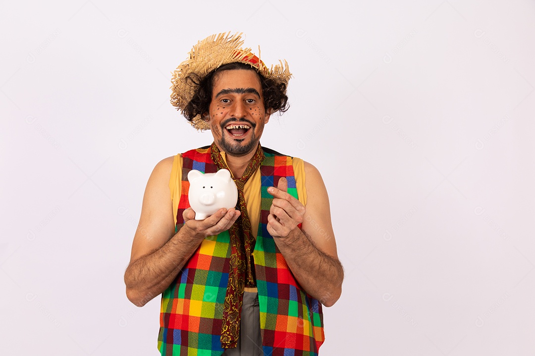 Homem jovem fantasiado celebrando festas juninas