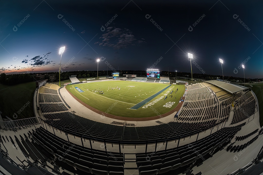Tiro panorâmico do estádio com campo e stands sob a noite