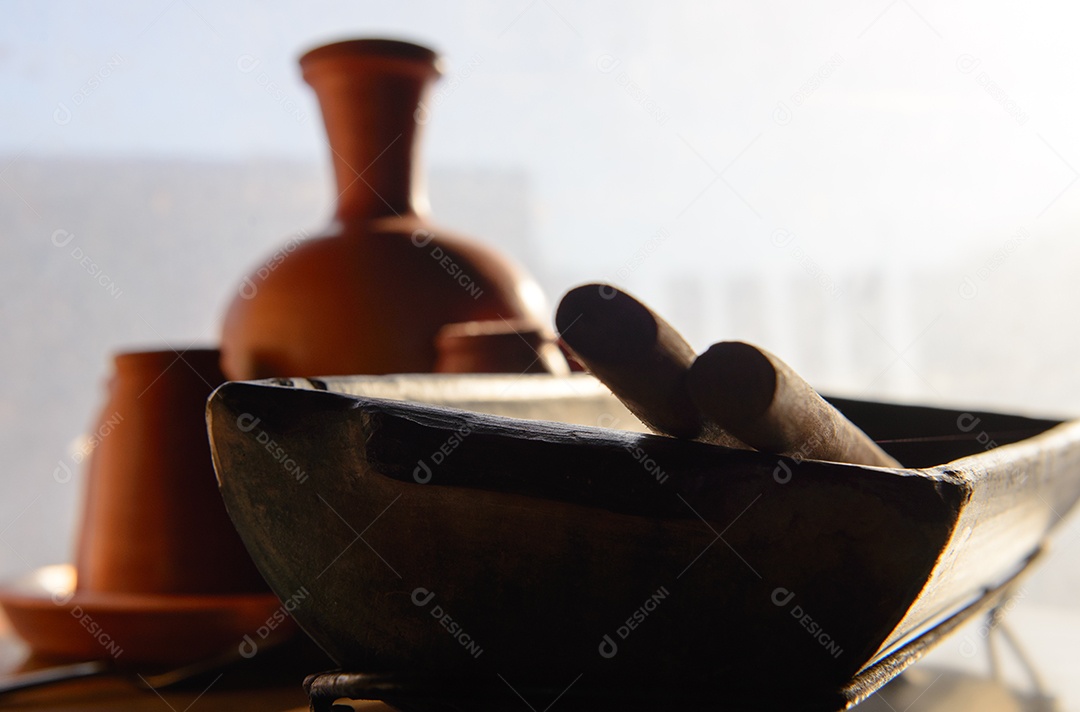 Jarro, xícara e tigela de barro