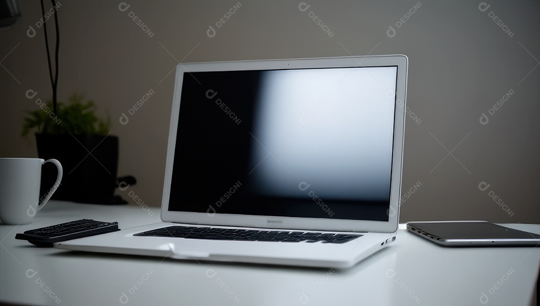 Mesa de escritório sobre essa mesa um notebook