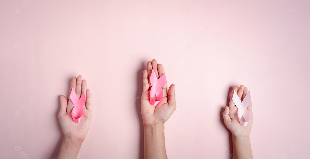 Fitas multicoloridas em fundo rosa, conscientização do câncer, dia mundial do câncer