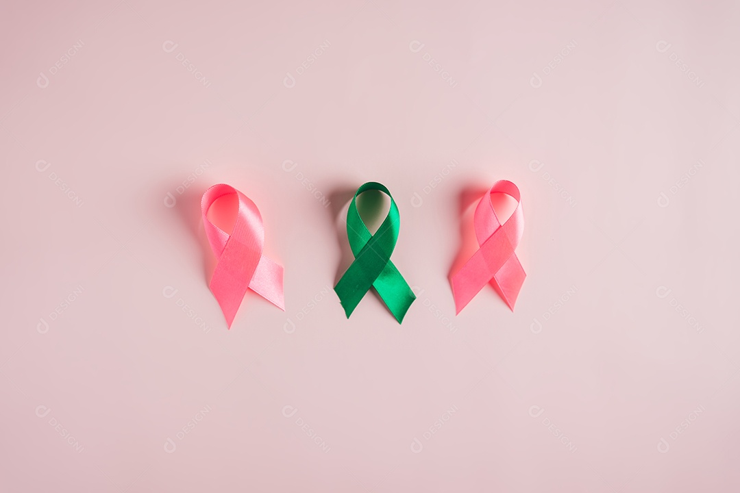 Fitas multicoloridas em fundo rosa, conscientização do câncer, dia mundial do câncer