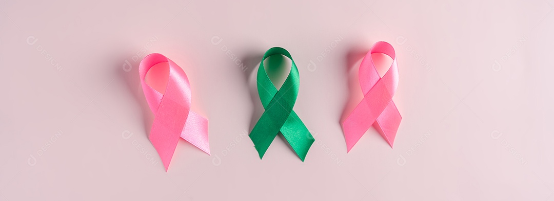 Fitas multicoloridas em fundo rosa, conscientização do câncer, dia mundial do câncer