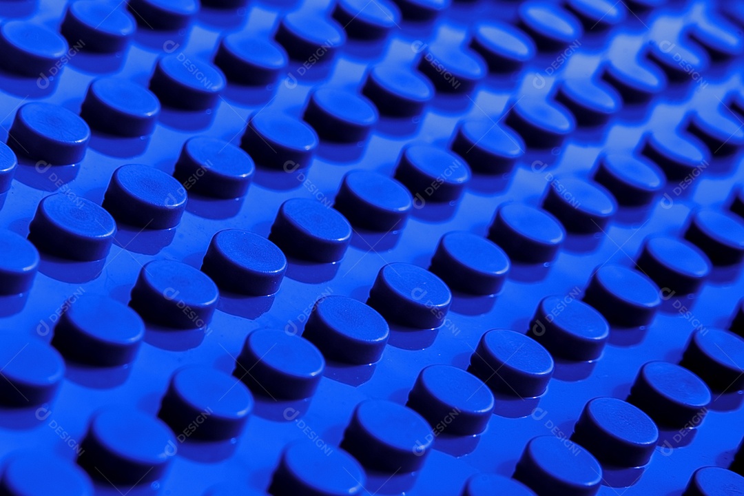 Fundo e textura abstratos azuis plásticos do botão