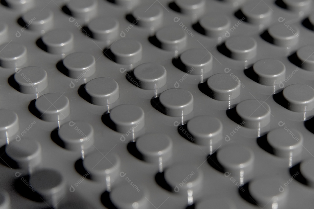 Fundo e textura abstratos pretos plásticos do botão