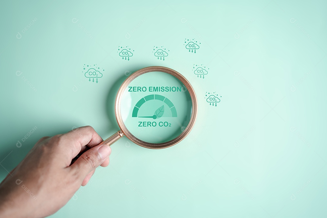 Foco da lupa no ícone de redução de CO2 na redução global da emissão de CO2 ou dióxido de carbono