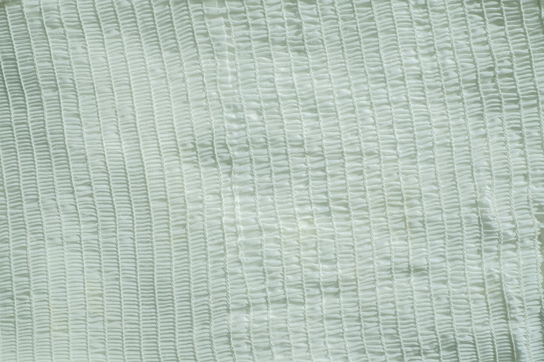 Fundo texturizado de tecido branco