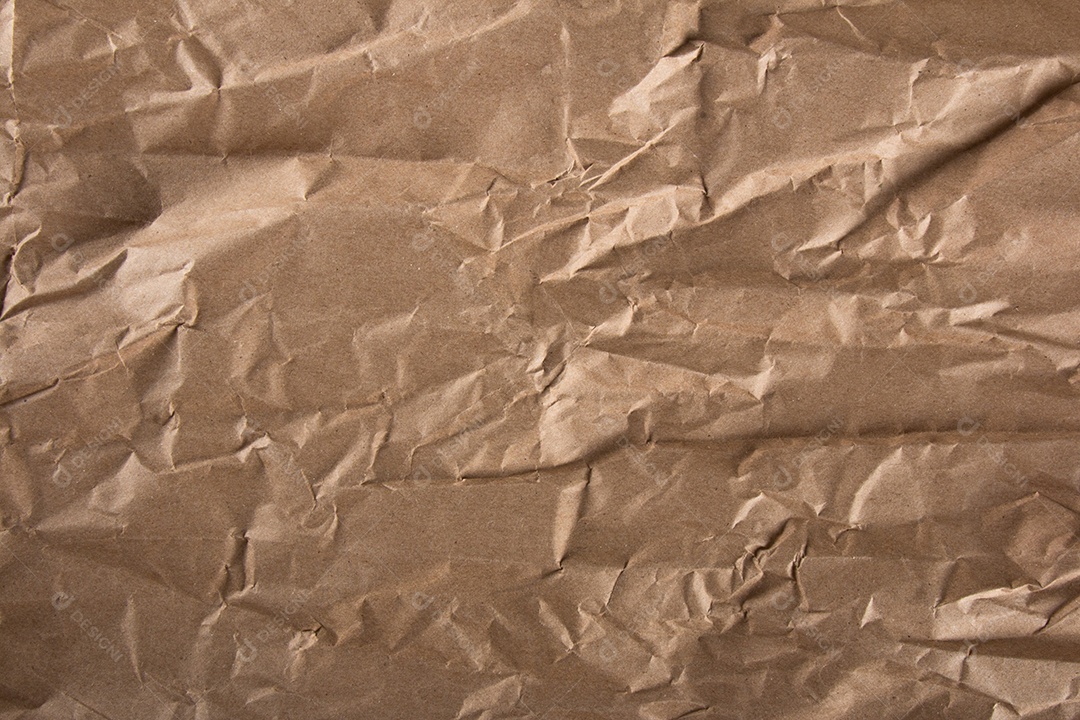 Textura de papel marrom amassado. plano de fundo texturizado ondulado.