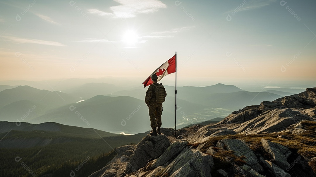 Soldado com um rifle e uma bandeira canadense nas montanhas