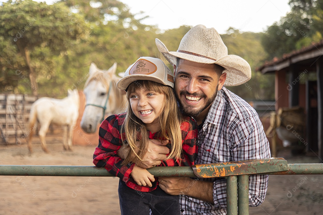 Filha ao lado de seu pai agropecuarista