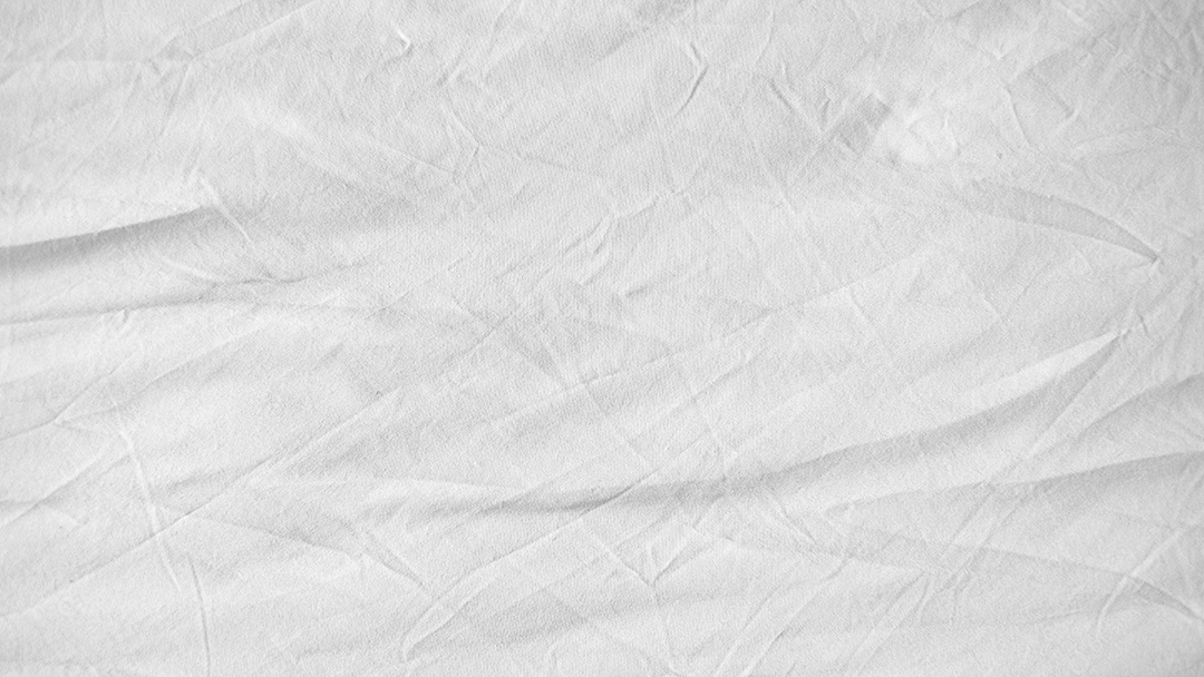 Lençol branco amassado, textura gradiente de roupa de cama branca