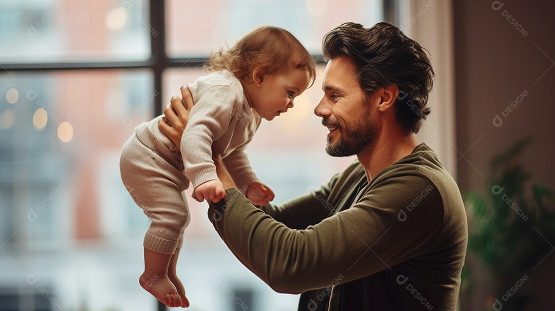 Pai pegando filho bebê