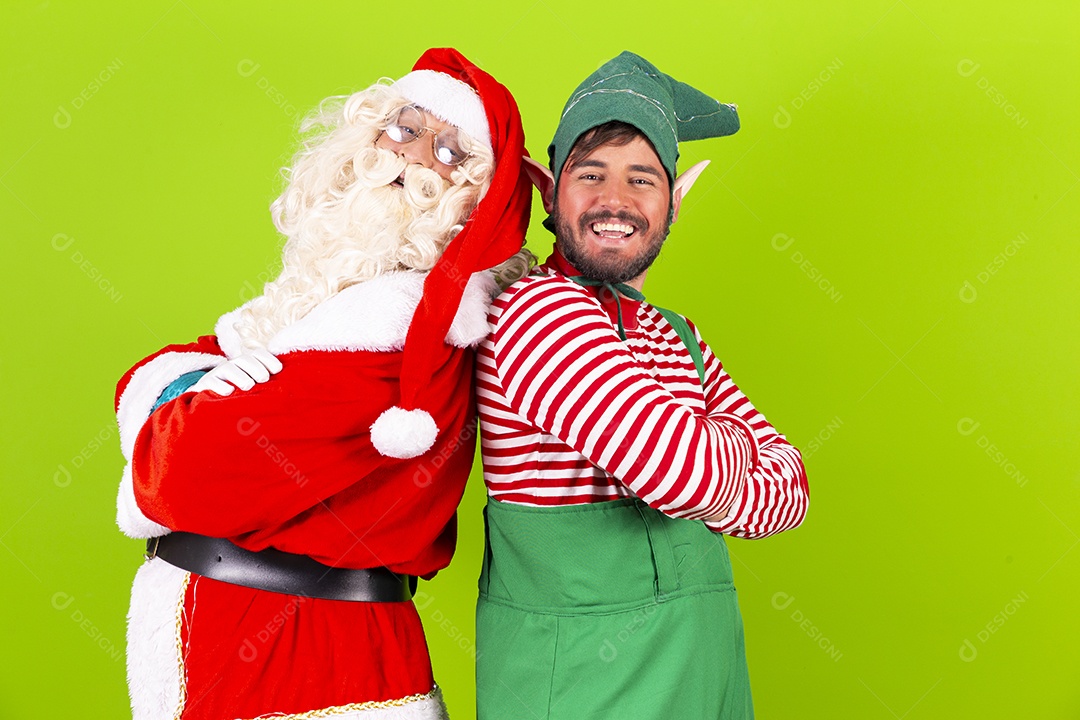 Homens fantasiados de Papai Noel e duende