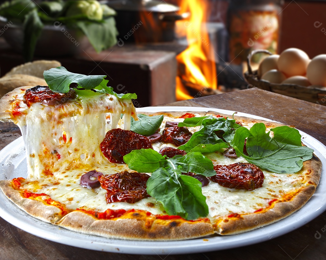 Delicious pizza of dry cheese and tomatoes