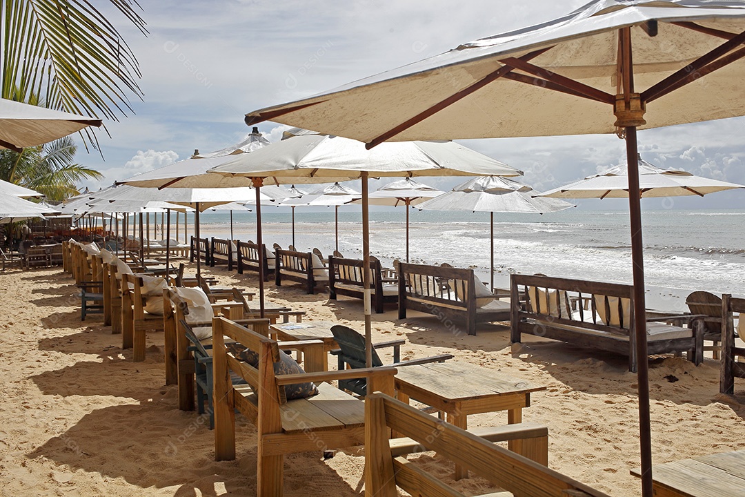 Cadeira de praia e guarda chuva