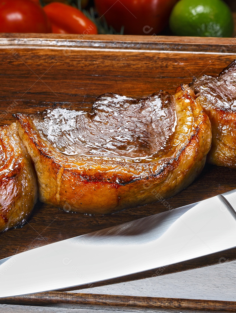 Fatias de picanha assada no espeto