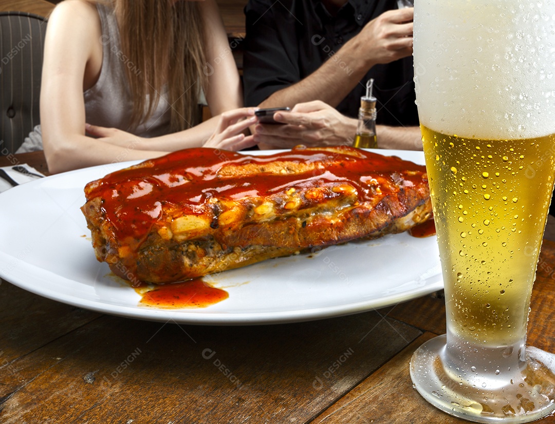 Costela assada com molho barbecue