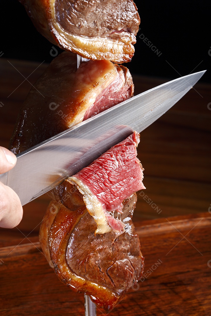 Corte de picanha assada no espeto