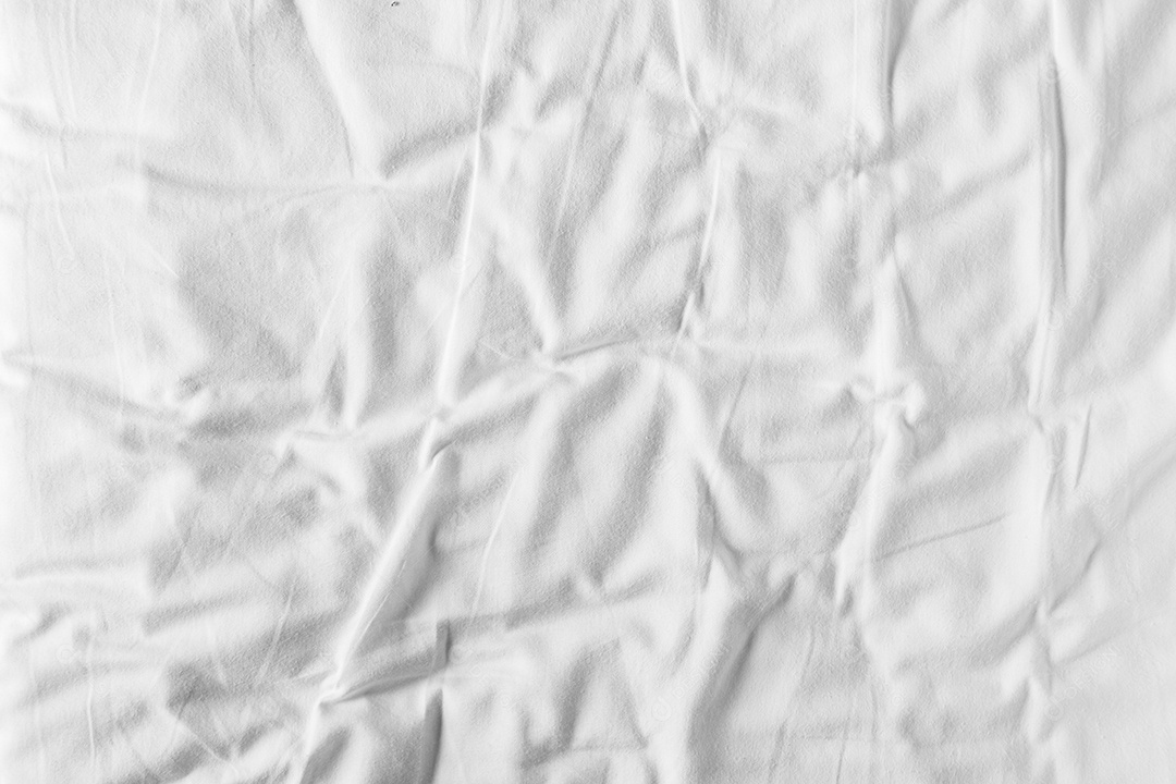 Lençóis brancos abstratos ou textura de fundo de tecido branco enrugado e textura