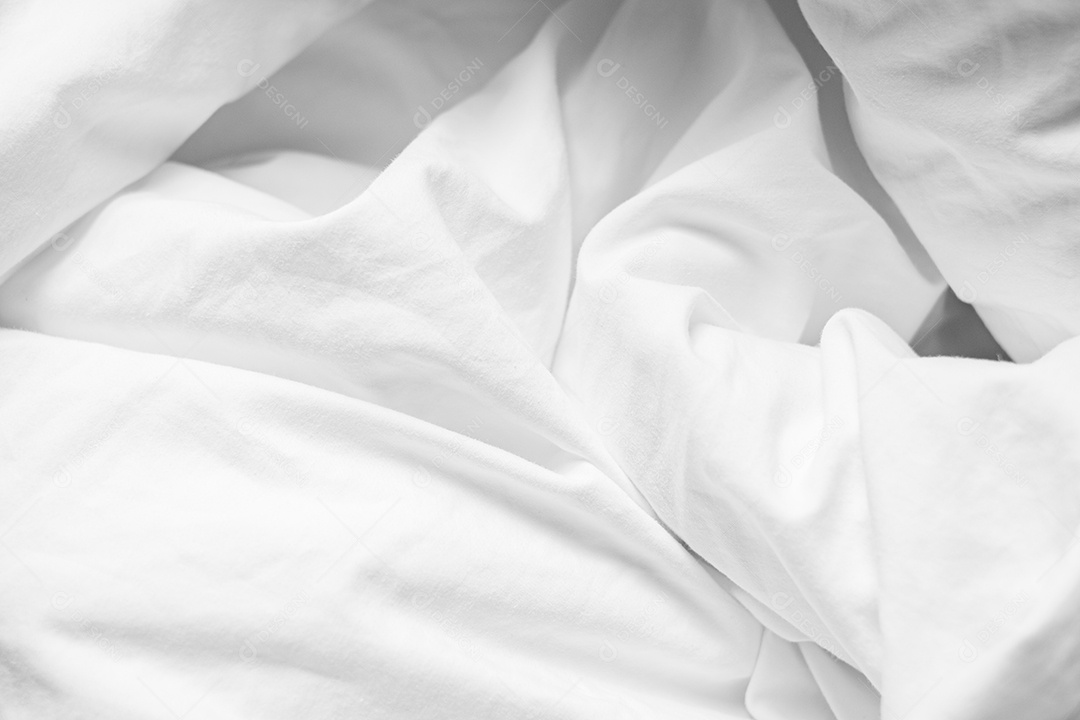 Lençóis brancos abstratos ou textura de fundo de tecido branco enrugado e textura