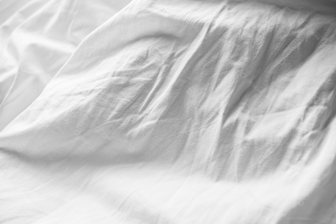 Lençóis brancos abstratos ou textura de fundo de tecido branco enrugado e textura