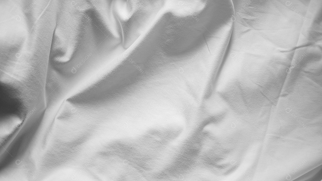Lençóis brancos abstratos ou textura de fundo de tecido branco enrugado e textura