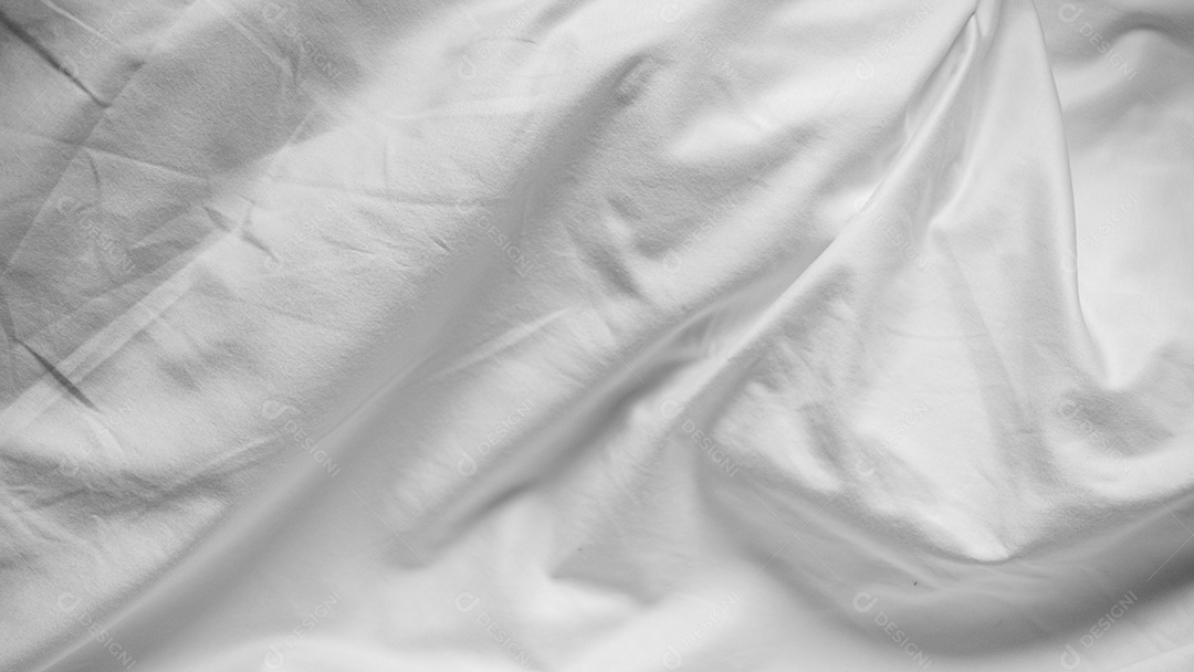 Lençóis brancos abstratos ou textura de fundo de tecido branco enrugado e textura